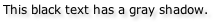 Screen capture from Safari showing gray text shadow on black text
